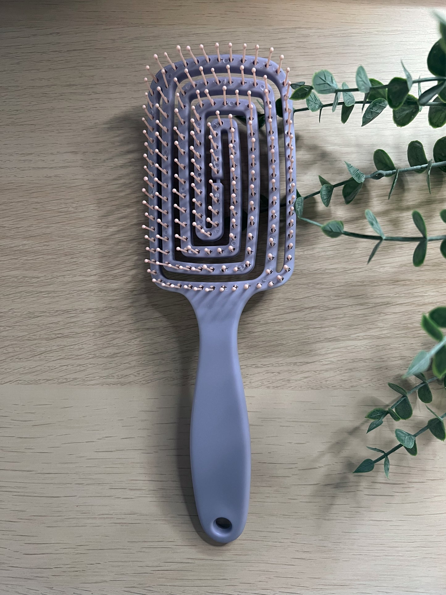 Große flexible Haarbürste